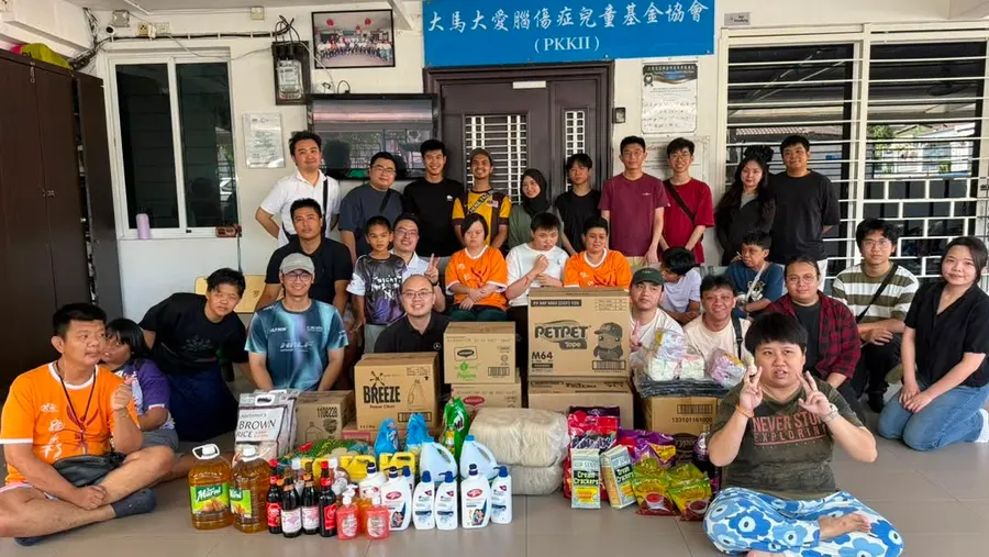Advisory Apps team handing over a charity donation drive to a community welfare association