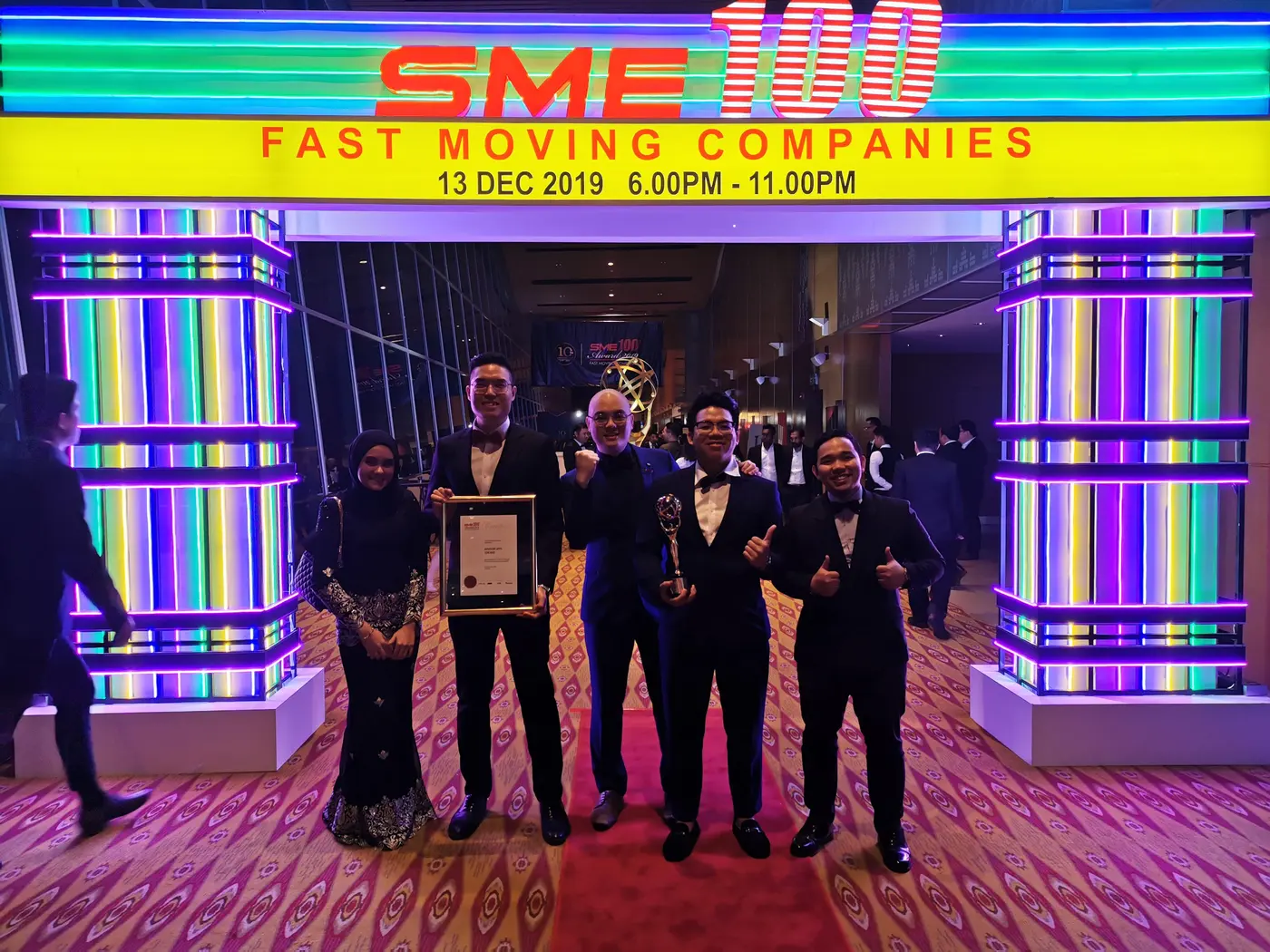 Advisory Apps team receiving the SME100 Fast Moving Companies award in Malaysia